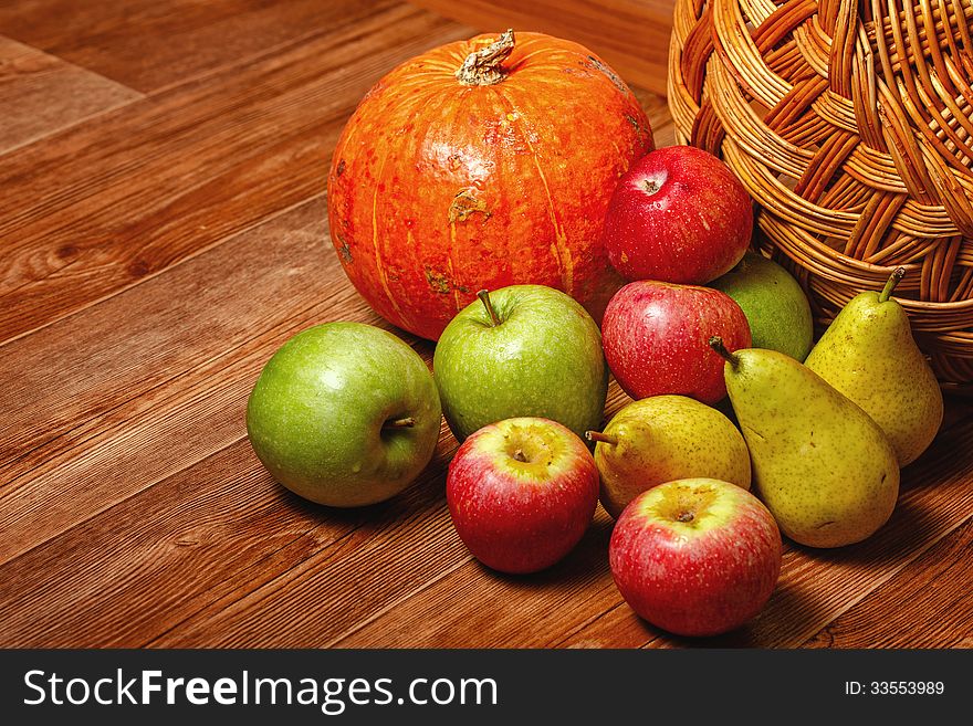 Harvest of ripe fruits and vegetables: apples, pears and pumpkin. Harvest of ripe fruits and vegetables: apples, pears and pumpkin
