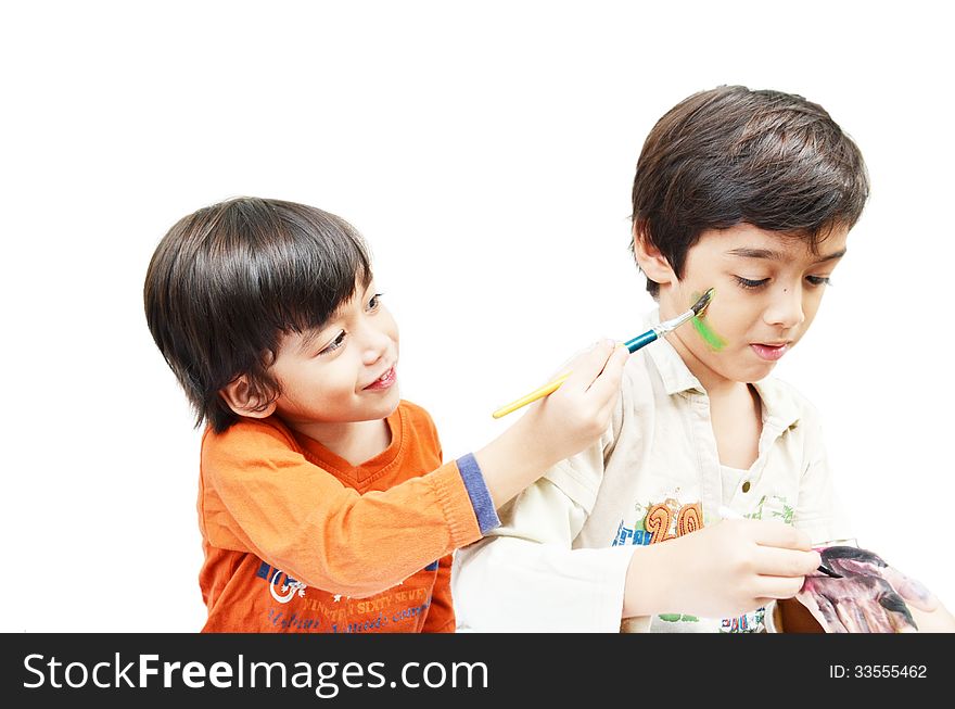 Little boy painting water color white background. Little boy painting water color white background