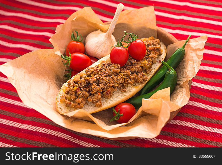 Sandwich with minced meat mexican style with vegetables