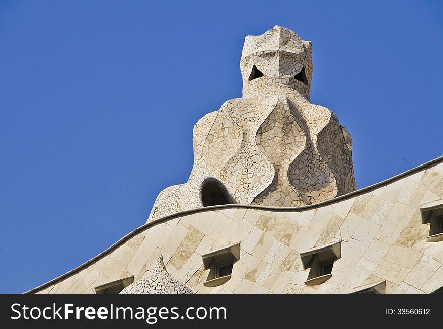 The phantoms sculpture on the roof of La Pedrera Building from Antoni Gaudi architect. Passeig de Gracia, downtown Barcelona, Catalunia, Spain. The phantoms sculpture on the roof of La Pedrera Building from Antoni Gaudi architect. Passeig de Gracia, downtown Barcelona, Catalunia, Spain.