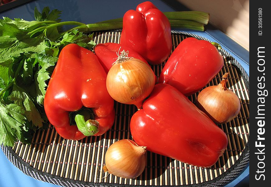 still life with peppers, onions and celery