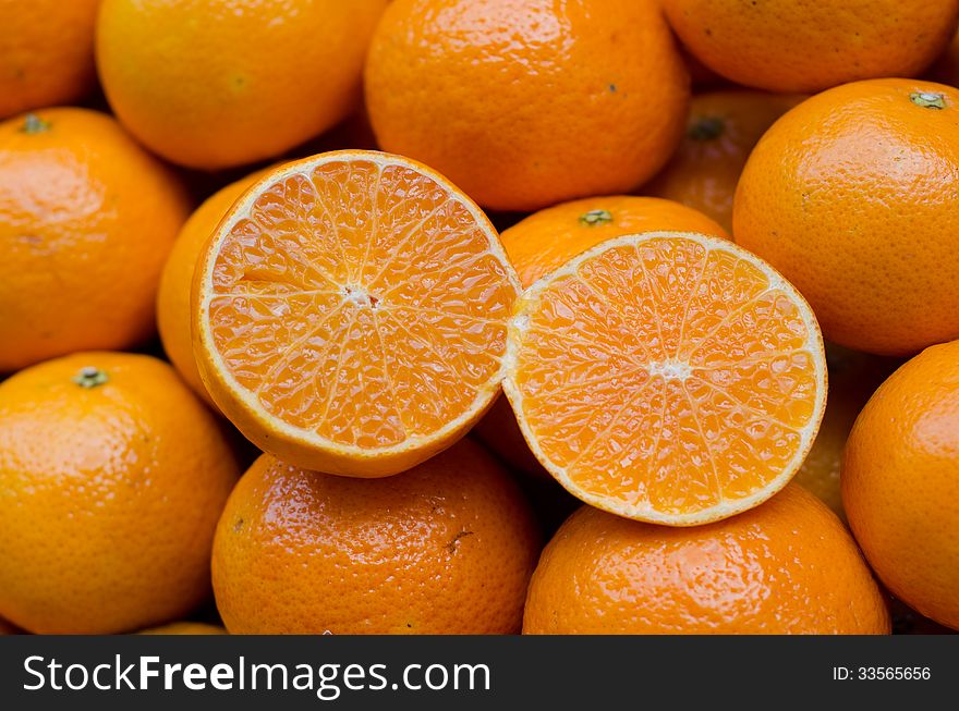 Juicy orange fruits for fresh orange juice. Juicy orange fruits for fresh orange juice