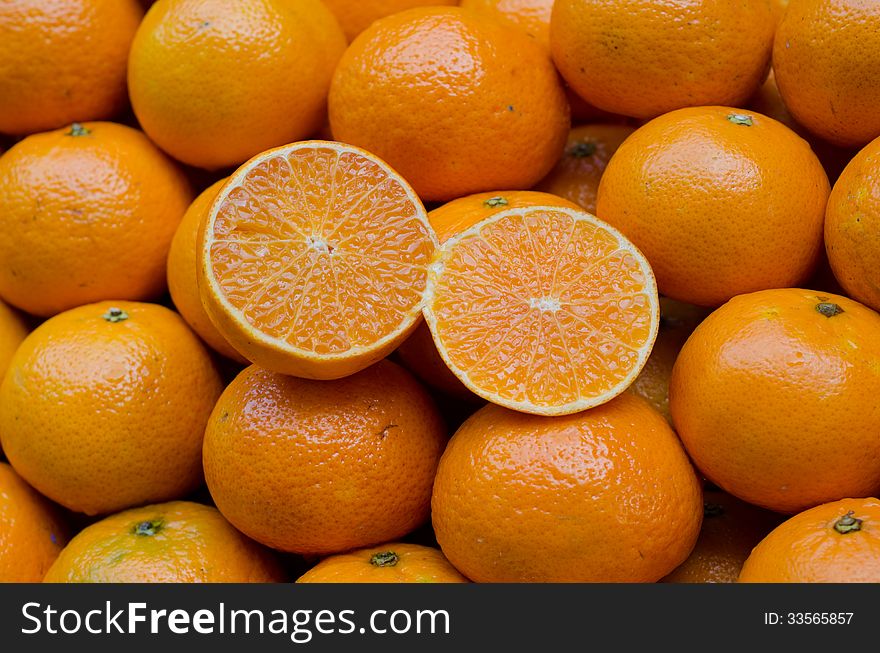 Juicy orange fruits for fresh orange juice. Juicy orange fruits for fresh orange juice
