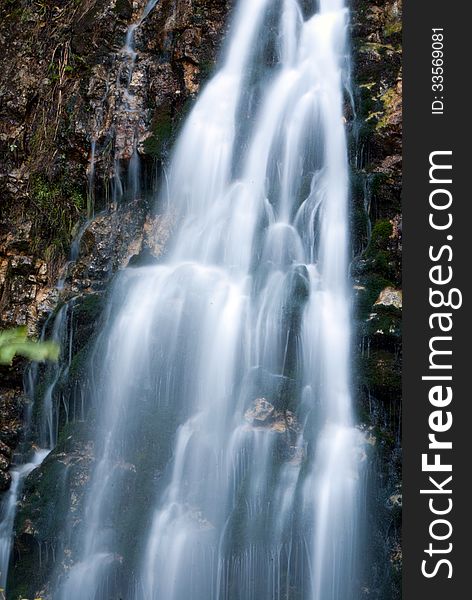 Foamy and ethereal mystic waterfall in the Carpathian mountains