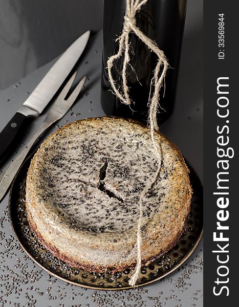 Cheesecake with black sesame seeds on Halloween. From the series Cheesecake for the holiday