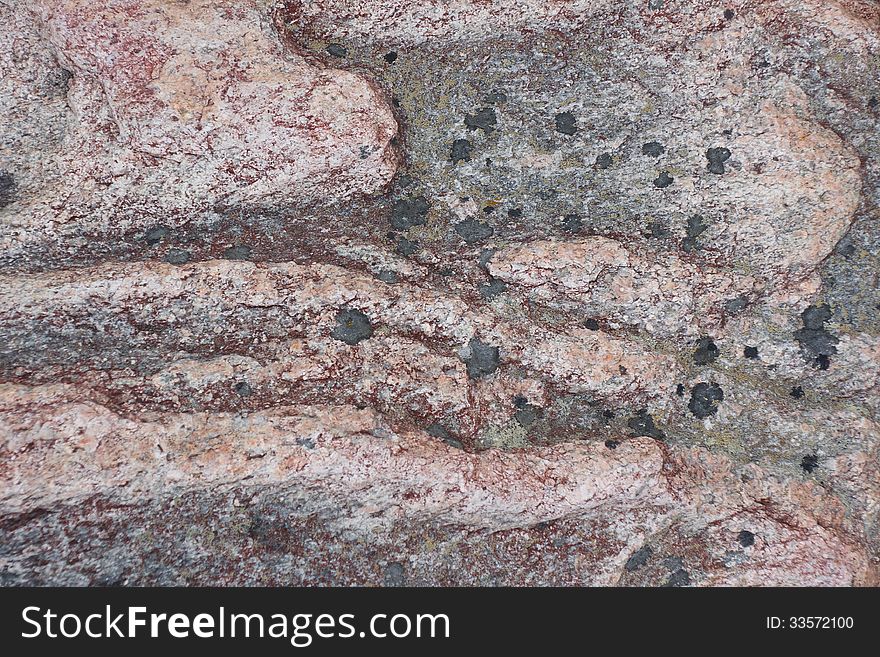 Surface of natural  dark red stone