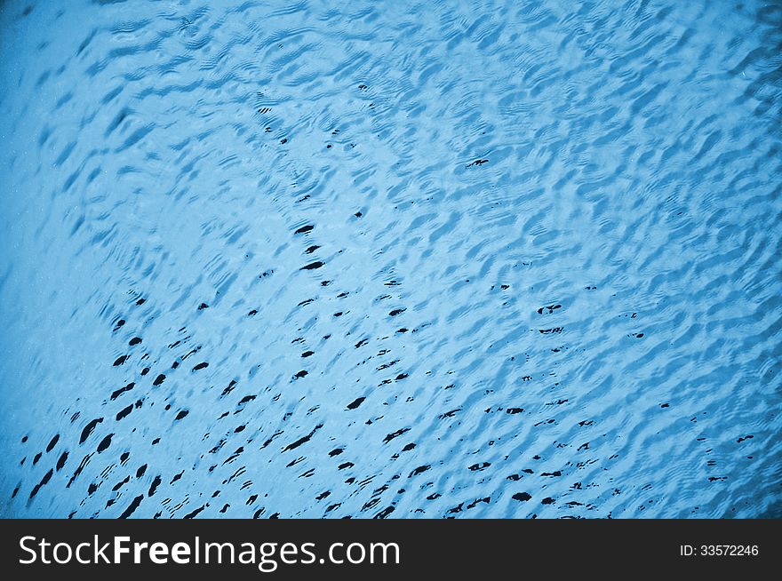 Blue water waves in swimming pool