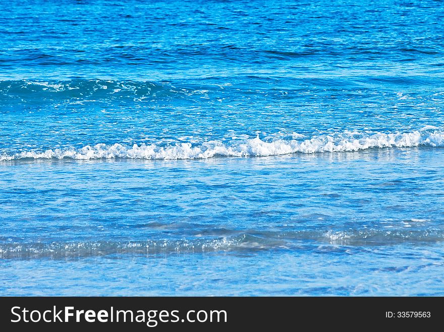 Small surf waves from the Gulf of Mexico in Florida. Small surf waves from the Gulf of Mexico in Florida