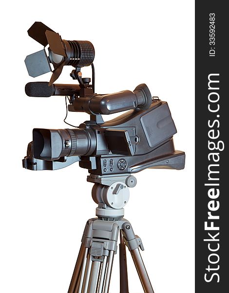 Professional video camera on a tripod isolated on white background