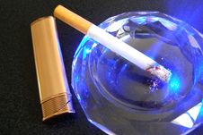 Cigarette And Lighter Royalty Free Stock Photography