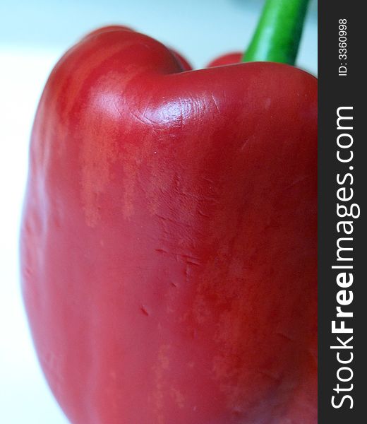 Close up shot of a red pepper from the side. Close up shot of a red pepper from the side