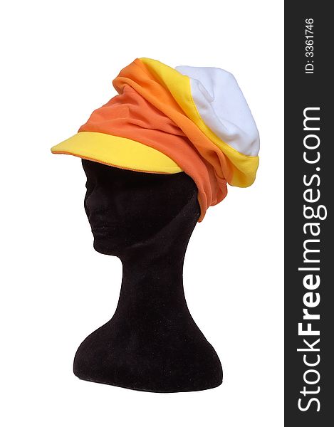 Stylish fur female cap on a dummy
