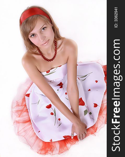 Sexy model in white dress with red. Isolated