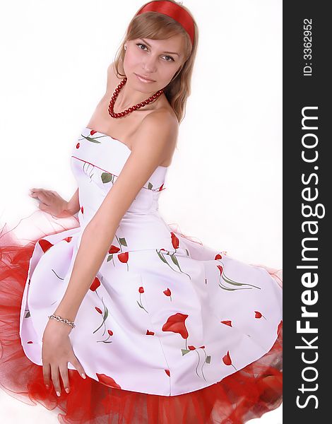 Sexy model in white dress with red. Isolated