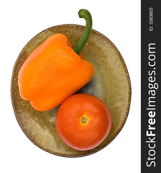 Capsicum and tomato on a plate