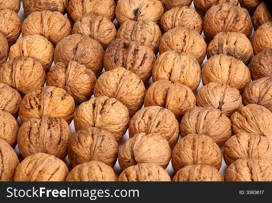 Walnuts background. not just nuts- like crowd or soldiers.