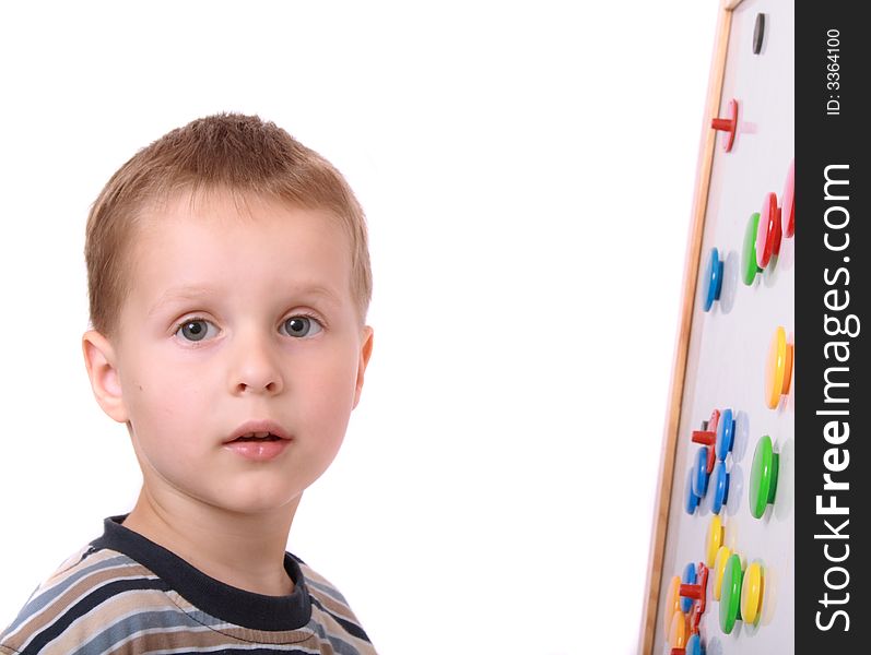 Young boy and the white board on the white background