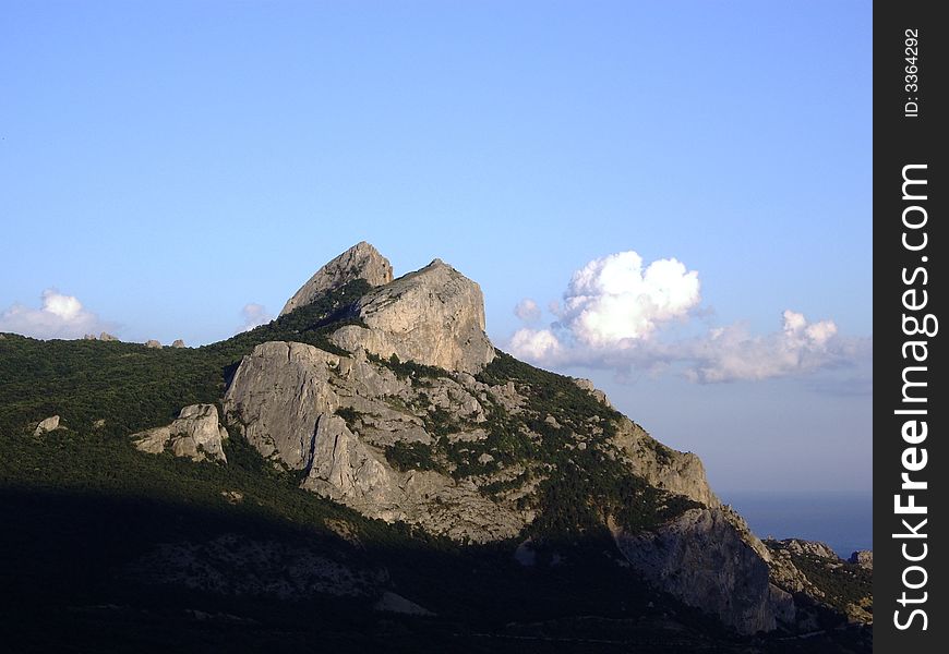 Photo of the cliff, looking as the bear sihluet in Crimea (Ukraine). Photo of the cliff, looking as the bear sihluet in Crimea (Ukraine)