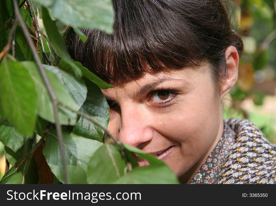 Beautiful woman walking in the autumn park. Beautiful woman walking in the autumn park