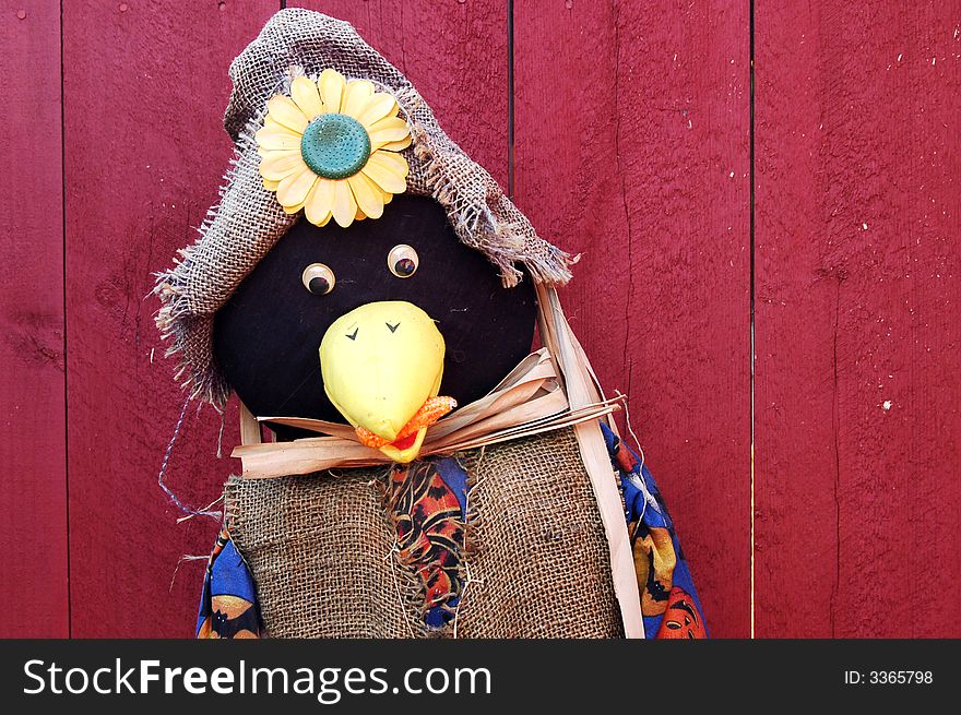 A scarecrow decoration for the fall harvest or Halloween