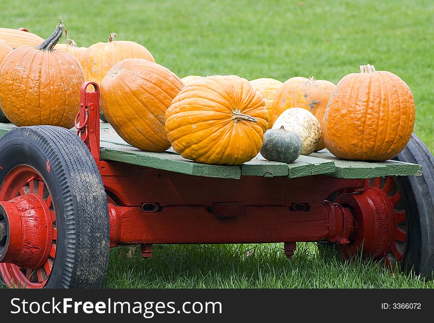 Old relic of a wagon to carry pumpkins. Old relic of a wagon to carry pumpkins