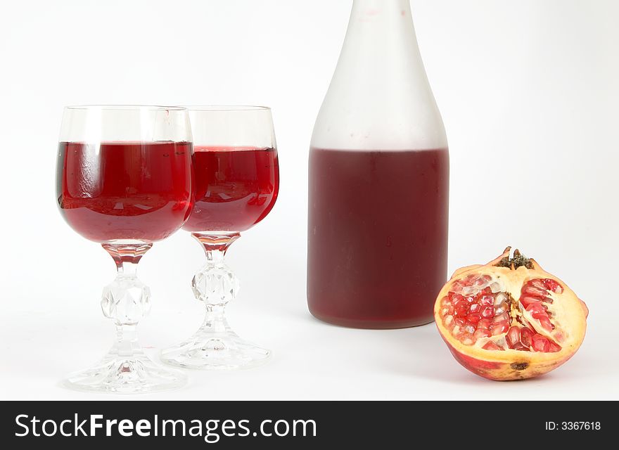 An image of bottle of wine and wine glasses