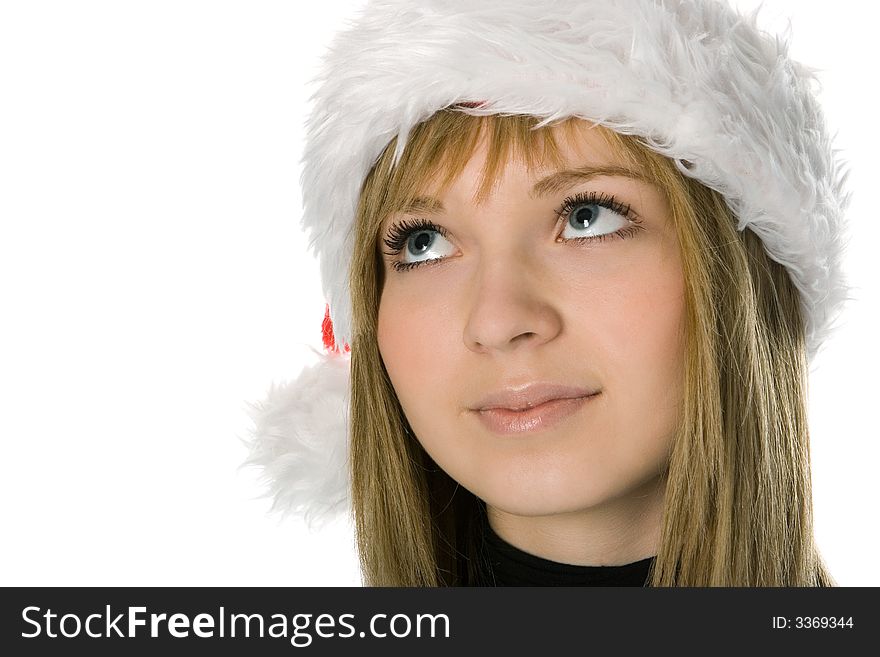Close up girl face in santa hat over white background
