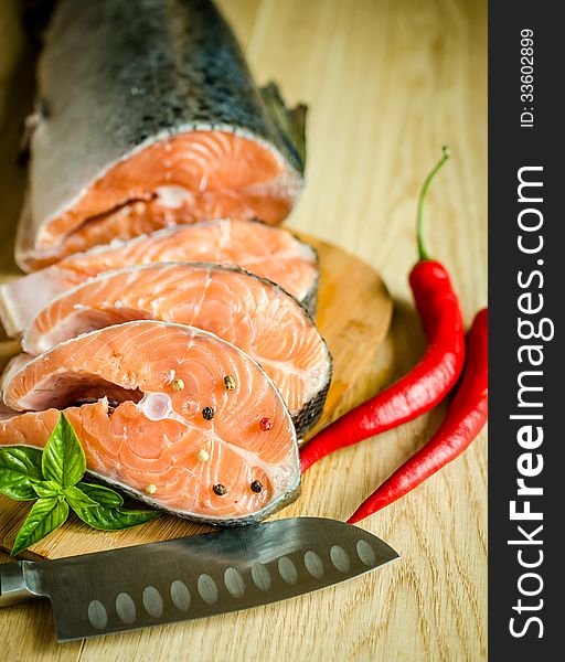 Fresh salmon steaks with spices