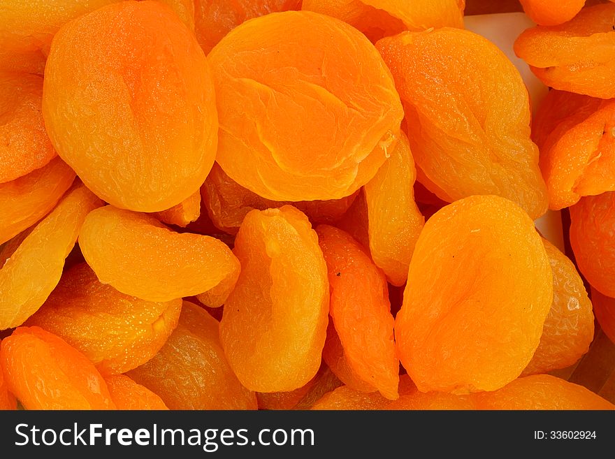 Closeup of apricots forming a background.