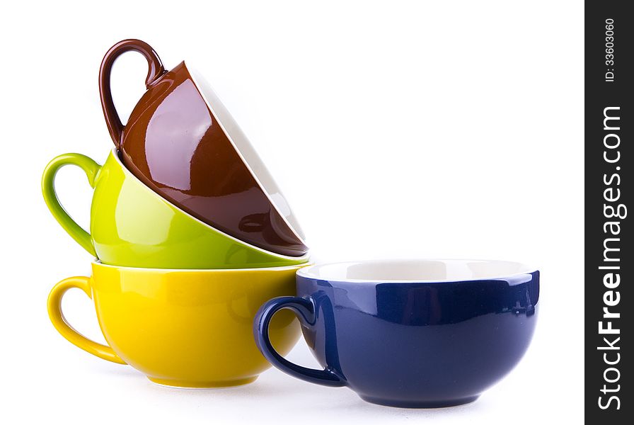 Colorful ceramic cup on white background