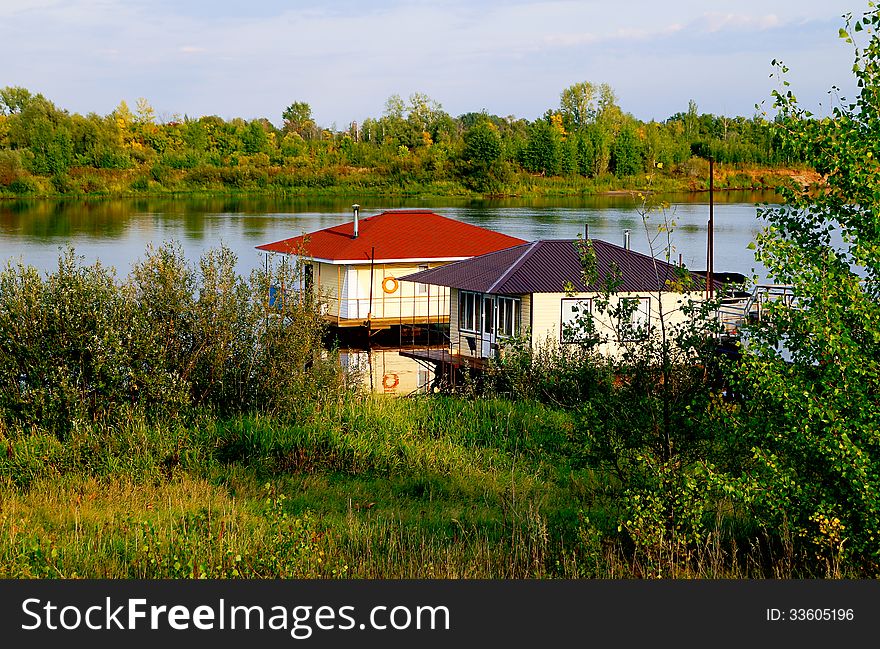 The lodges standing on water at the river bank. The lodges standing on water at the river bank