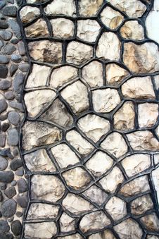 Fragment Of An Modern Handmade Stone Wall As Backgrounds. Royalty Free Stock Photo Fragment Of An Modern Handmade Stone Wall As Backgrounds. Royalty Free Stock Photo