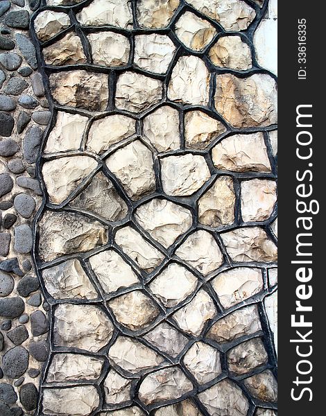 Fragment Of An Modern Handmade Stone Wall As Backgrounds.