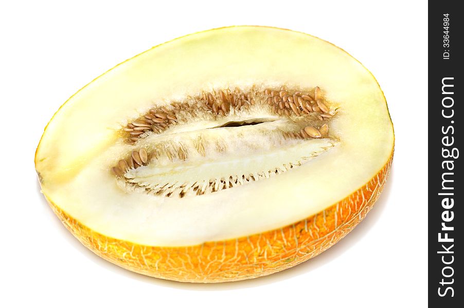 Half cut melon on a white background. Half cut melon on a white background