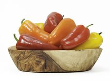Red, Orange, And Yellow Peppers In Wood Bowl Royalty Free Stock Image Red, Orange, And Yellow Peppers In Wood Bowl Royalty Free Stock Image