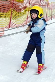 Child Skier On Ski Lift Royalty Free Stock Images