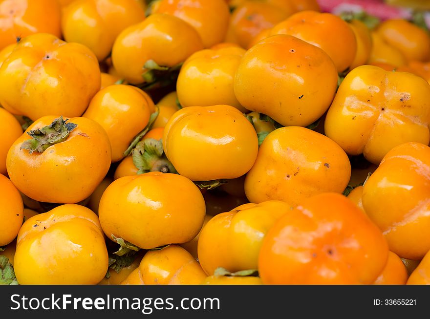 Persimmon fruit in local market, Thailand. Persimmon fruit in local market, Thailand