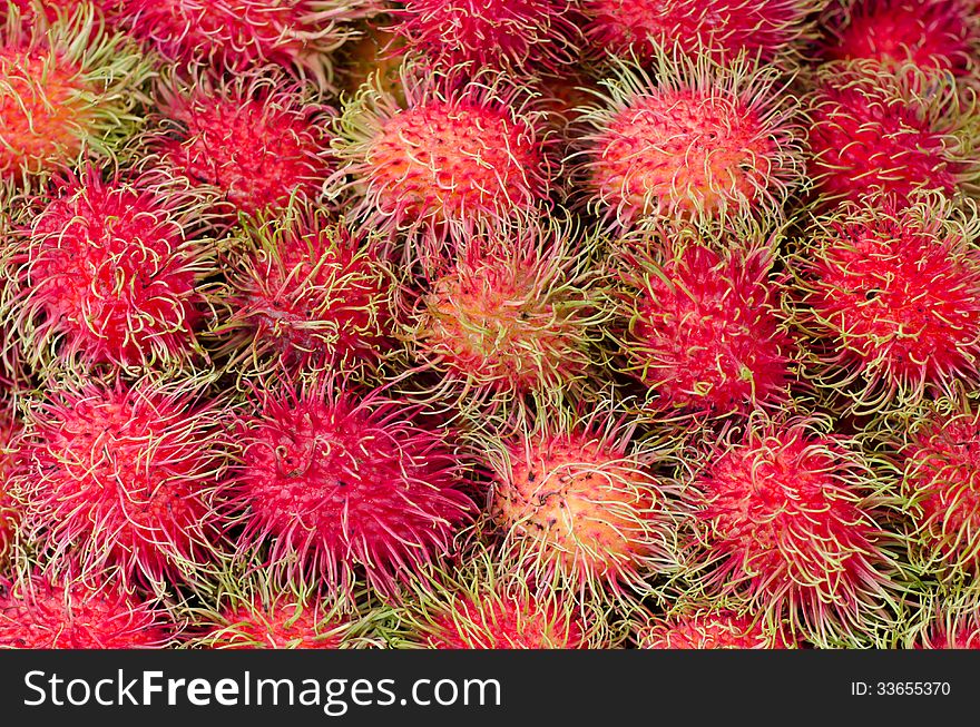 Red rambutan background and texture. Red rambutan background and texture