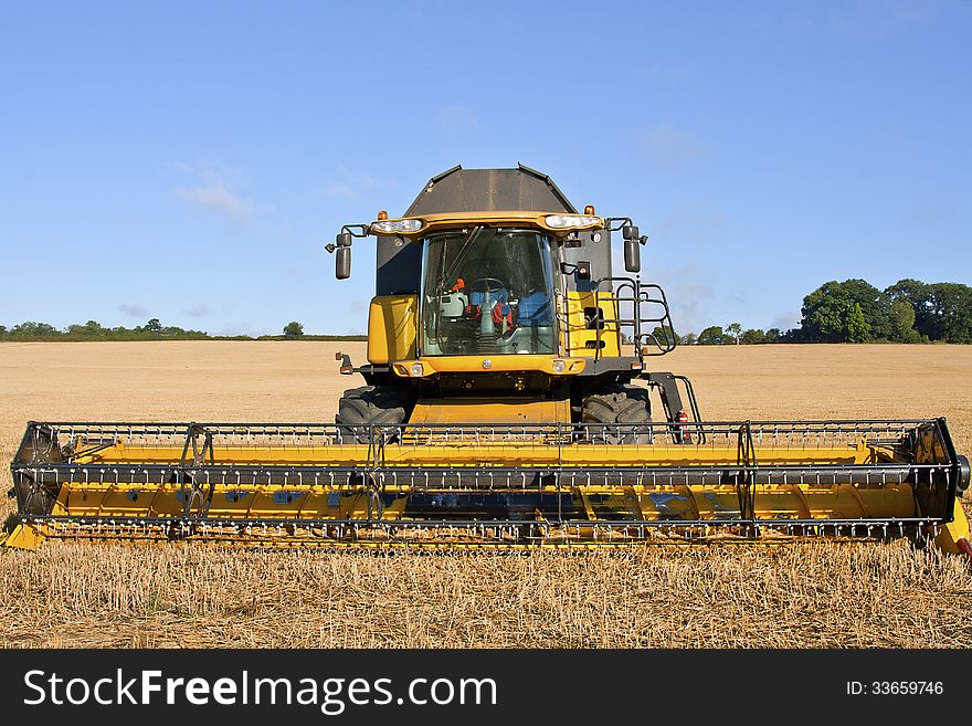 Image of a combine harvester. Image of a combine harvester