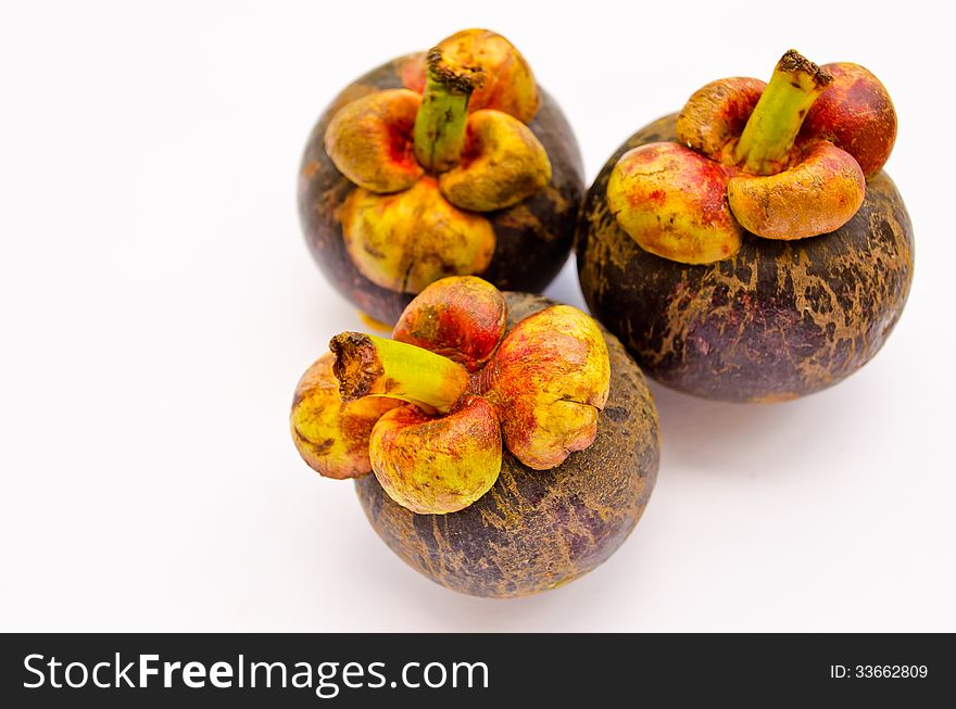 Mangosteen the queen of Thai tropical fruit grouping and isolated on white background