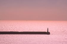 Lighthouse At Sunrise Stock Photo