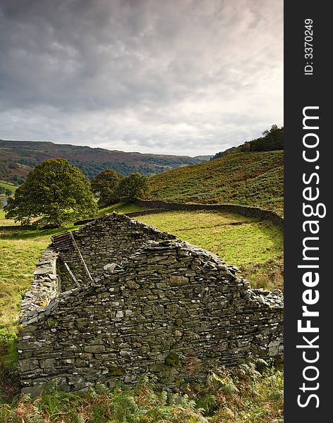 The ruins of a stone built barn in the English Lake District. The ruins of a stone built barn in the English Lake District