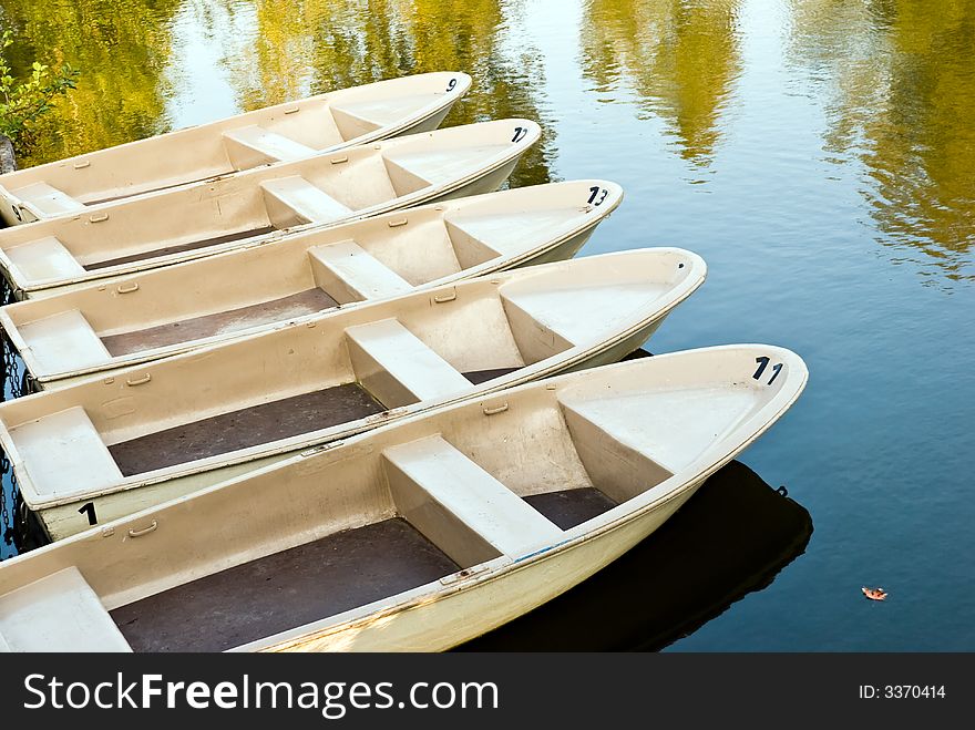 Boats on the lake.autumnal sky.