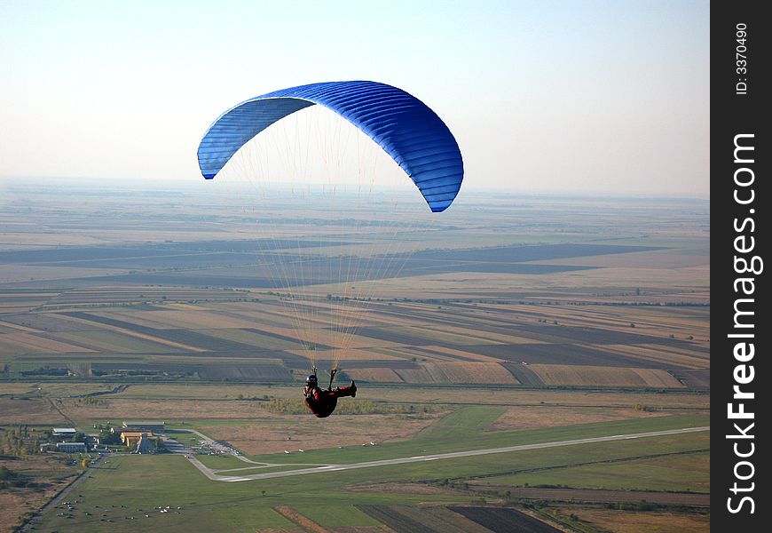 Para glider flying over the fields. Para glider flying over the fields