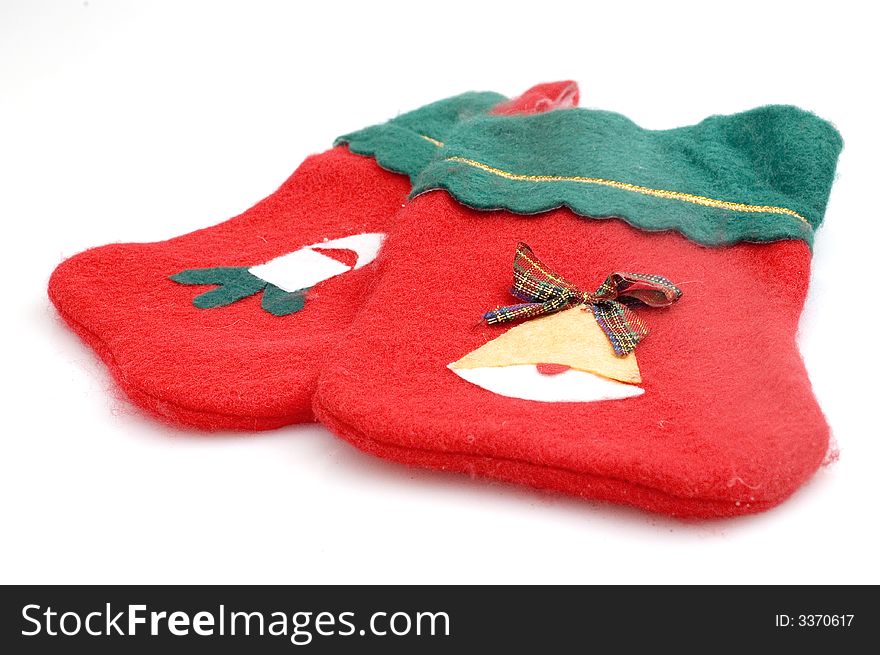 Photograph of Christmas stocking on white background.