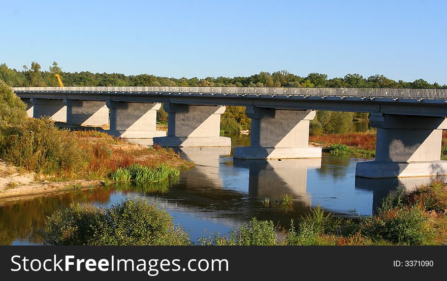 The bridge above river. In Ukraine.