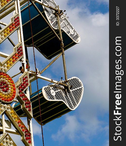 Abstract detail of carnival ride with brightly colored neon lights. Abstract detail of carnival ride with brightly colored neon lights