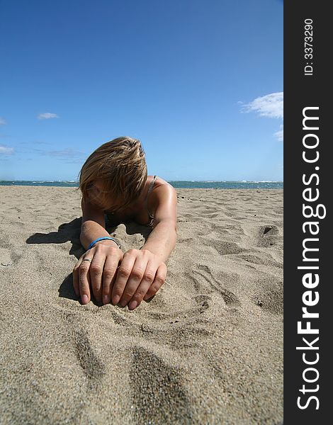 Young model at white sandy beach. Young model at white sandy beach