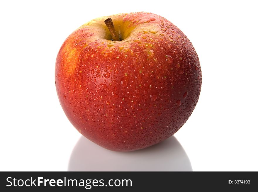 Isolated fresh and juicy apple with dewdrops. Isolated fresh and juicy apple with dewdrops