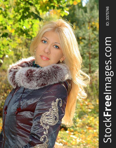Beautiful blond woman in autumn forest. Beautiful blond woman in autumn forest